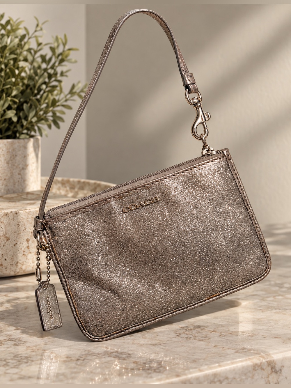 COACH Metallic Silver Wristlet Clutch with Silver Logo